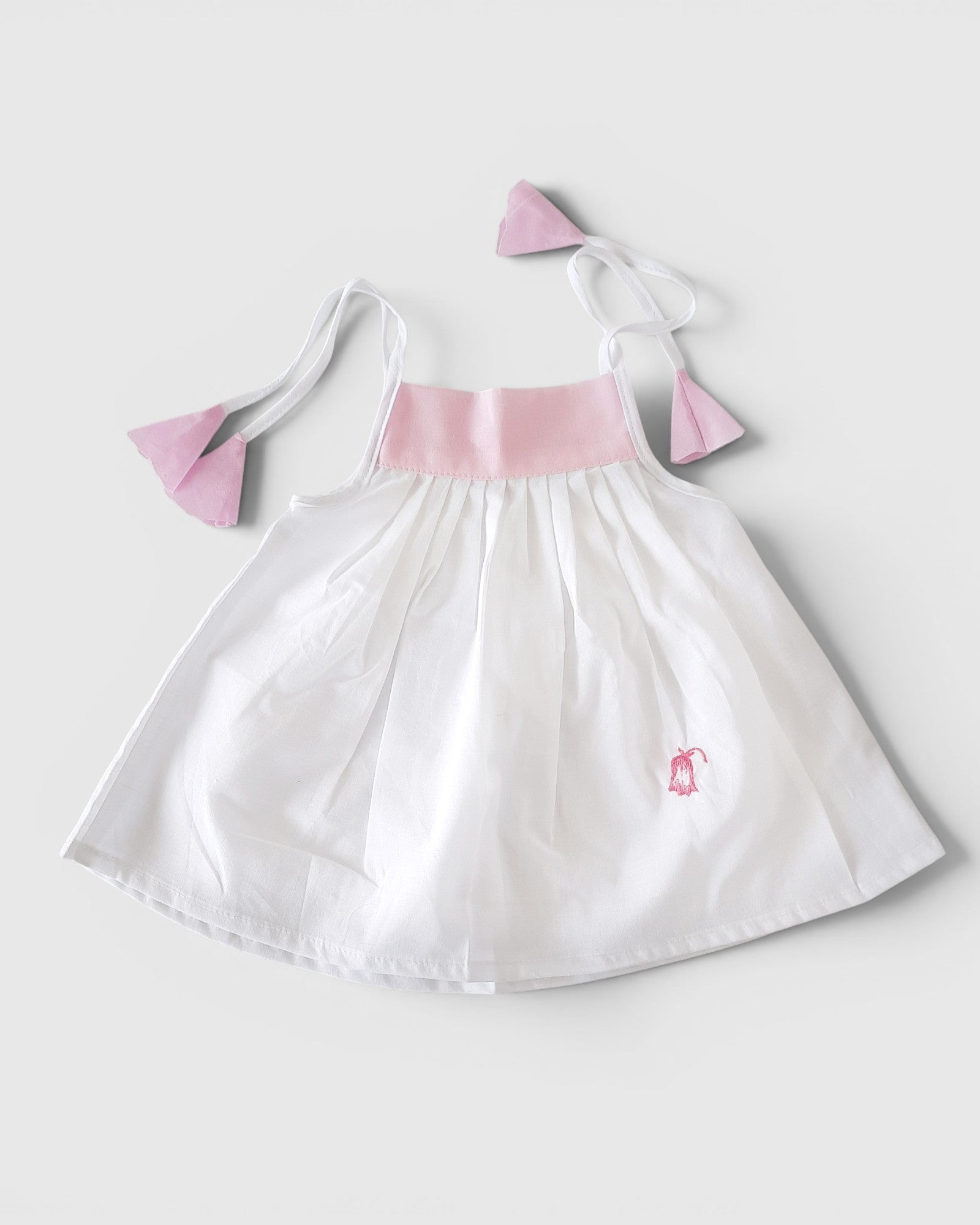 Pure Cotton Newborn Baby Girl Frock – Soft White Dress with Baby Pink Tie-Up Straps | Lightweight & Breathable
